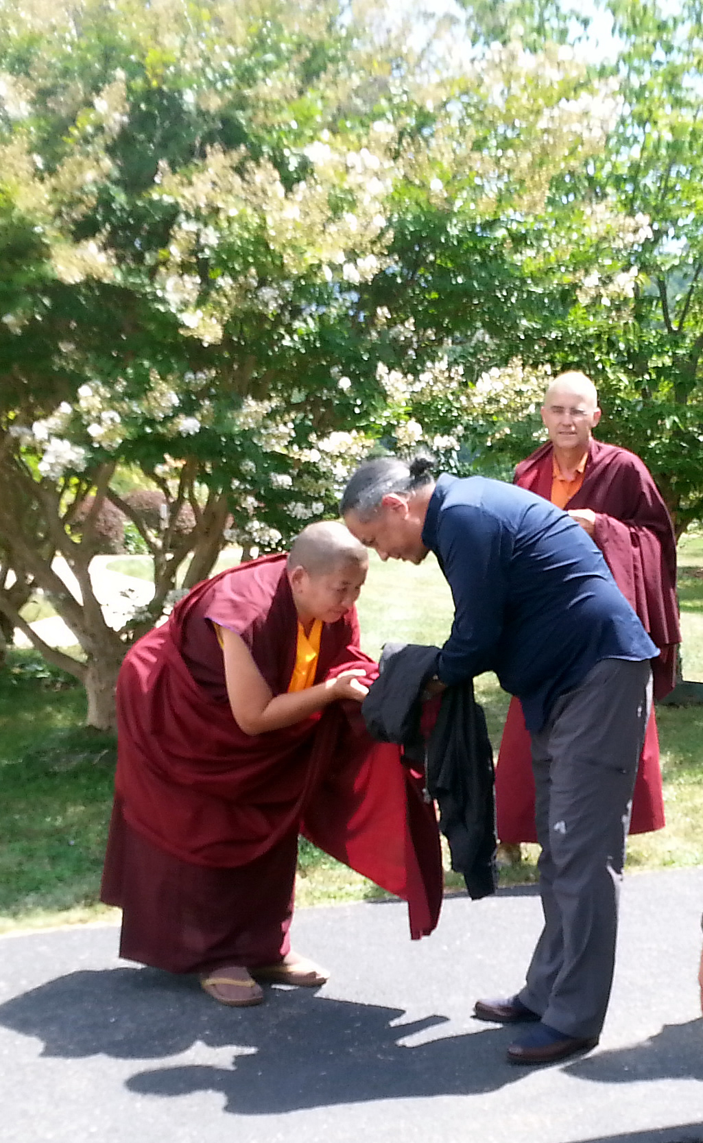 HE Jetsün Khandro Rinpoche says goodbye to HE Dzigar Kongtrul Rinpoche.