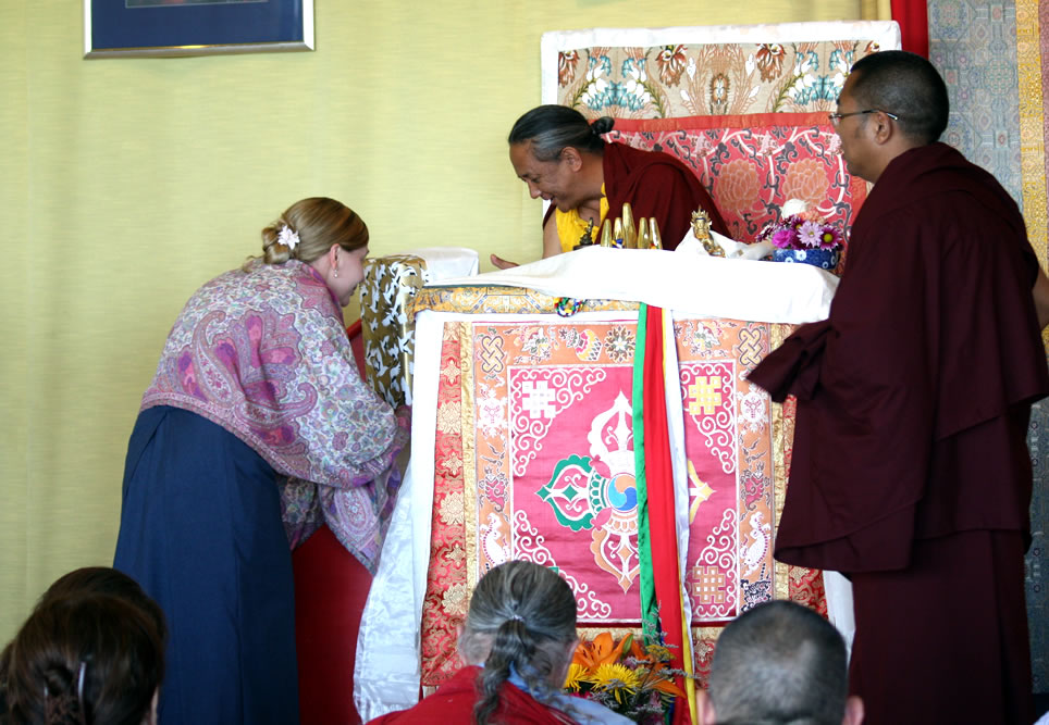 Lisa Cyrus, resident manager of Lotus Garden, offering to HE Dzigar Kongtrul Rinpoche during the closing ceremony.