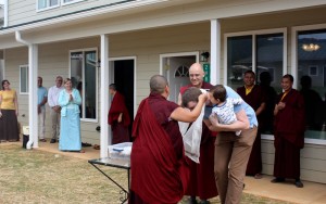 HE Jetsün Khandro Rinpoche presents the ceremonial scarf to Kunda Britton Bosarge la in gratitude for his management of the Tashi Chö Dzong project.