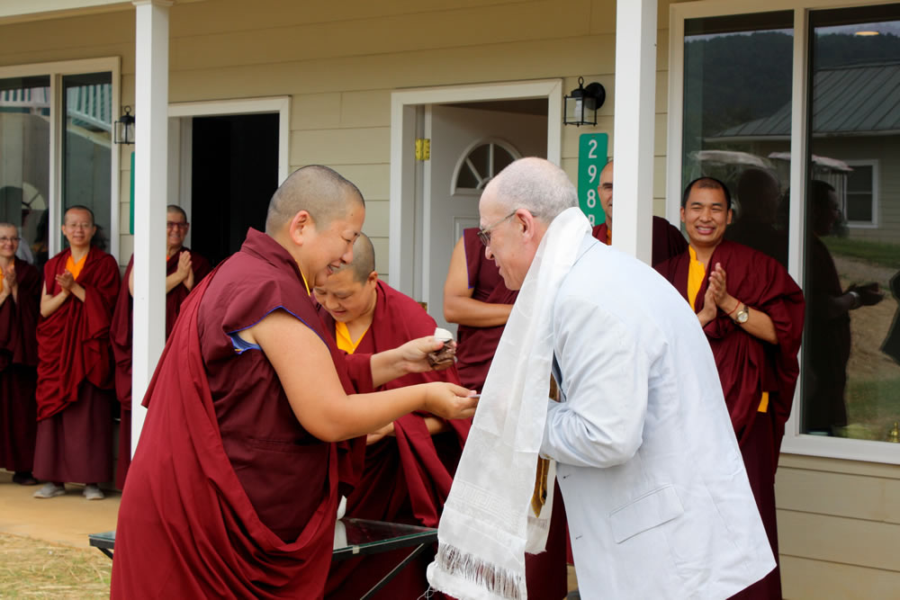 HE Jetsün Khandro Rinpoche presents Carl Rosenthal with the key to his room