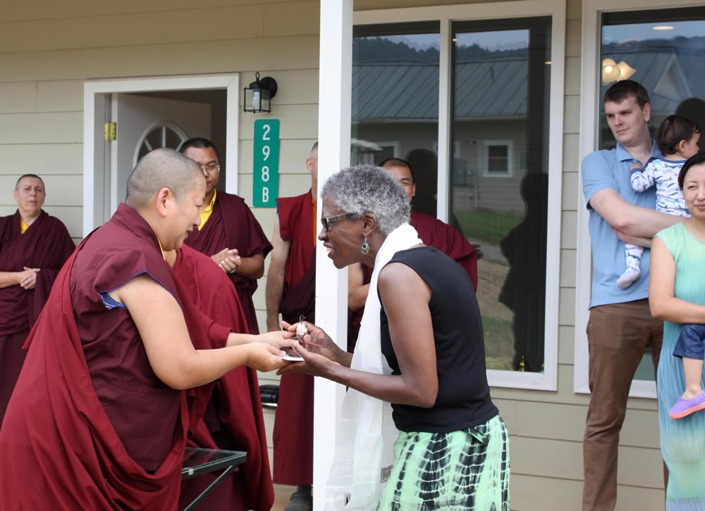 HE Jetsun Khandro Rinpoche presents Evelyn Cannon with the keys to her room