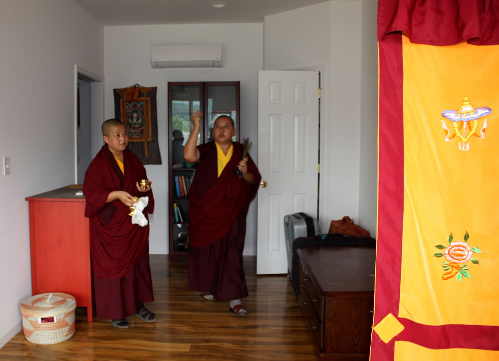 HE Jetsün Khandro Rinpoche blesses a retreat room.