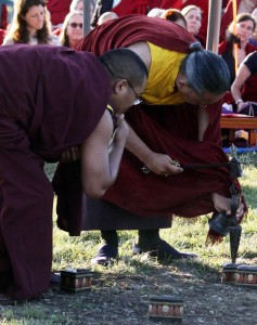 HE Dzigar Kongtrul Rinpoche stakes the kila marking the eastern direction.