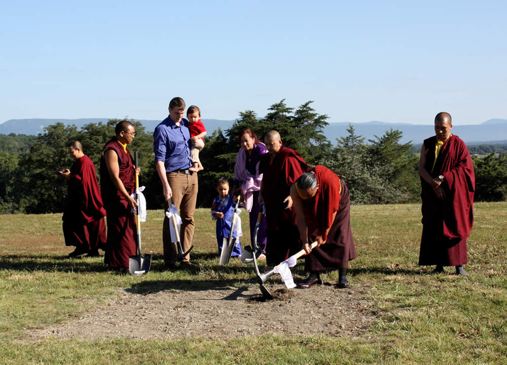 HE Dzigar Kongtrul Rinpoche breaks the ground.