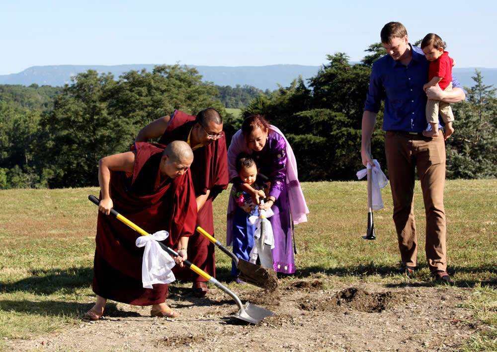 The Mindrolling family along with Ven. Acarya Namdrol Gyatso breaks the ground.