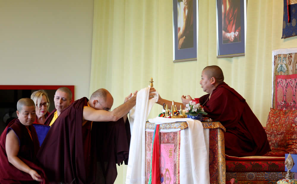 Drupön Roar Vestre presenting the mandala offering to Jetsün Khandro Rinpoche.