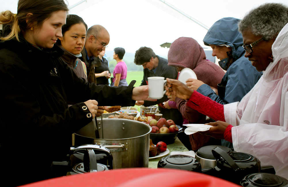 The Padma team serves a meal during the Annual Retreat.
