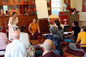 Jetsünla teaching during the Mindrol Lekshey Program. Seen here in the photo also, Anila Choenyid Choedron.