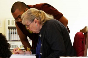 Ven. Thrinley Gyaltsen instructs students during a textual reading session.