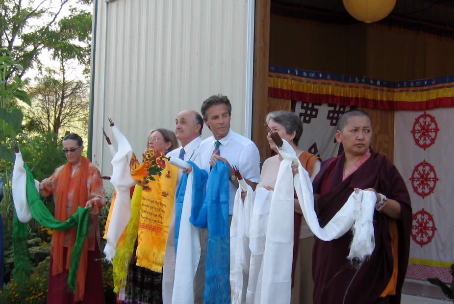 Rinpoche and lopöns await the arrival of the buddha statue to Lotus Garden.