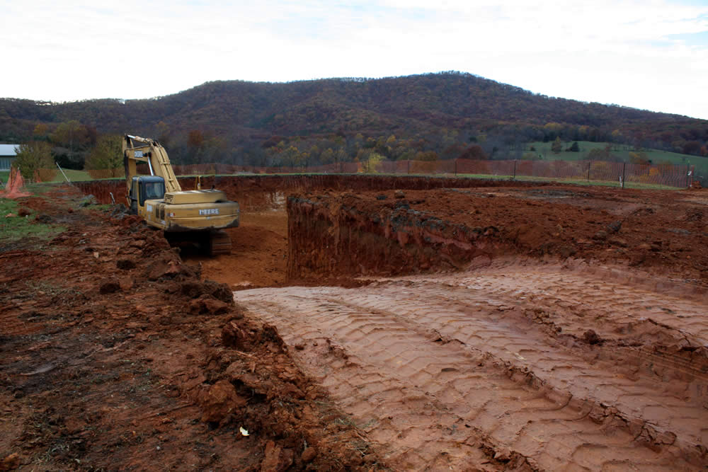 NOVEMBER 2&mdash;A ramp is made to allow machines and workers to enter the basement.