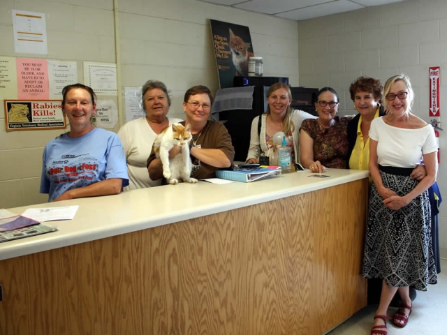 Members of the sangha pose with staff of the Page County Animal Shelter, one of the charities to whom Lotus Garden makes an annual donation in honor of Dungse Rinpoche&#039;s birthday.