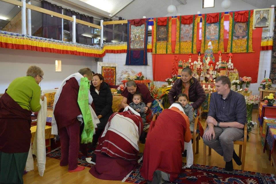 Offering khatags to the Mindrolling Family during the Mahasangha at Oberlethe, Germany. October 2016.