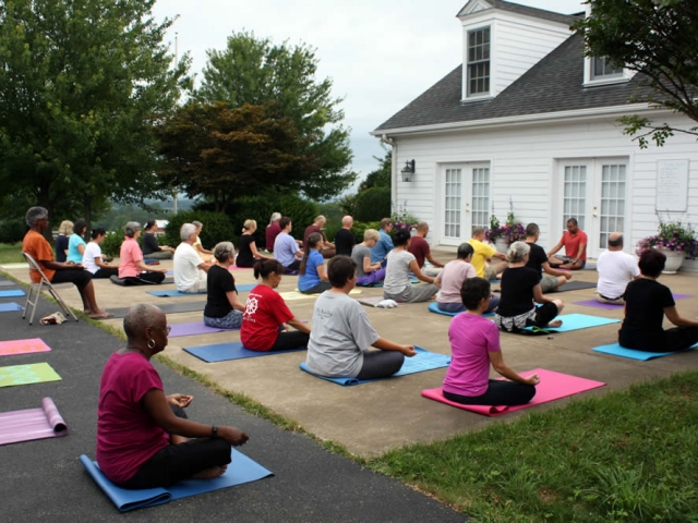 Acarya Ven. Namdrol Gyatso la leading pranayama yoga class.