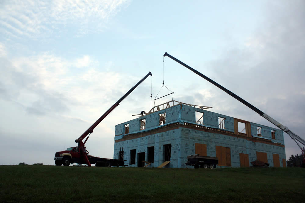JULY 14-First hip tail is attached to roof truss on western side of temple.