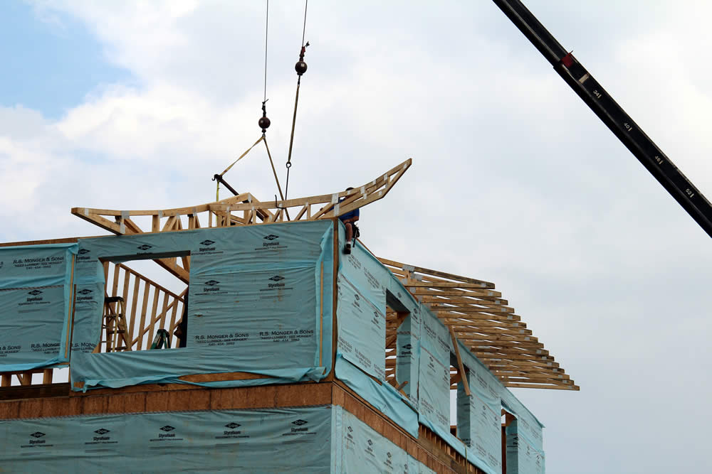 JULY 14-View of one of four of the roof&#039;s corner construction which will feature carved garudas when the temple is completed.