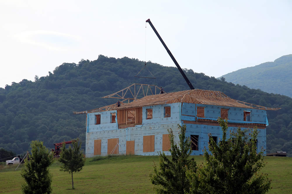 JULY 14-Installing roof trusses.