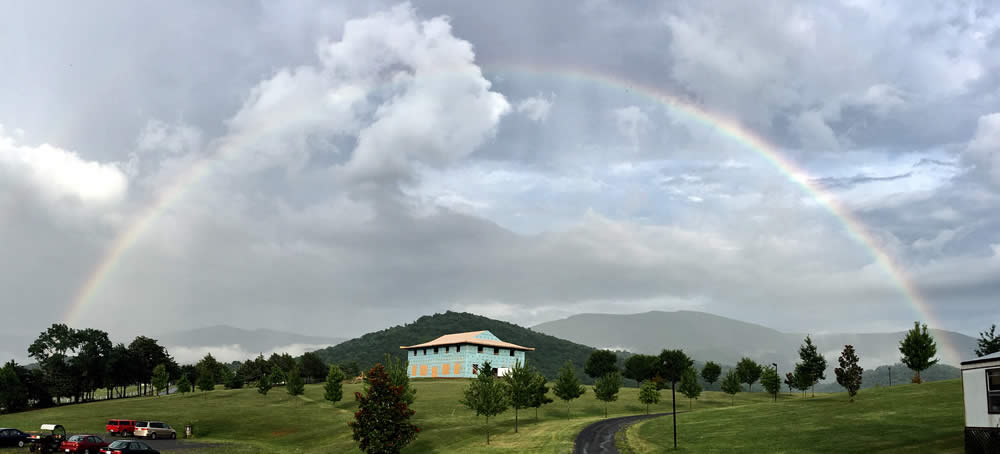 JULY 14-Lama Roar&#039;s photo of a complete rainbow over the temple site.