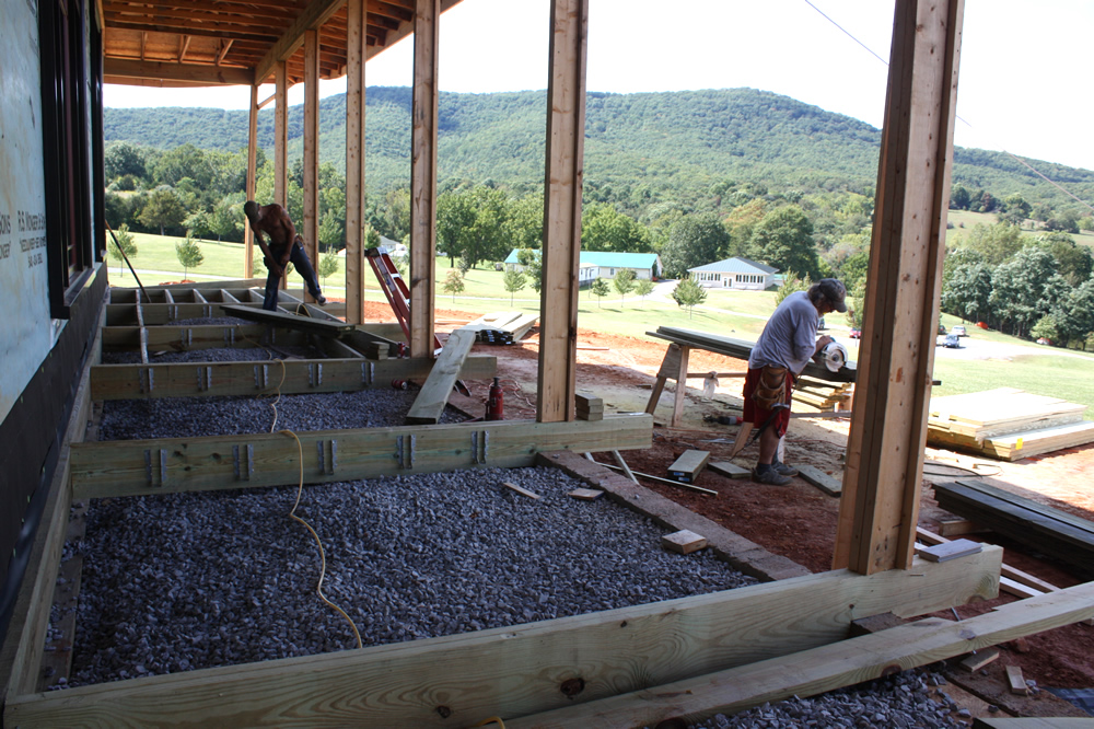 Constructing the support structure for the veranda deck.The veranda will extend around the entire temple and be available for over-flow seating when needed.
