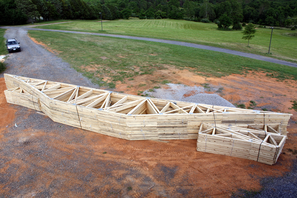 7 JUNE-Roof trusses are delivered.