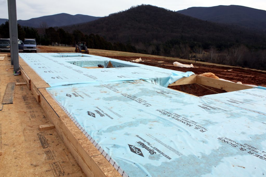 13 JANUARY&mdash;View to southeast with Tyvek-wrapped wall sections.