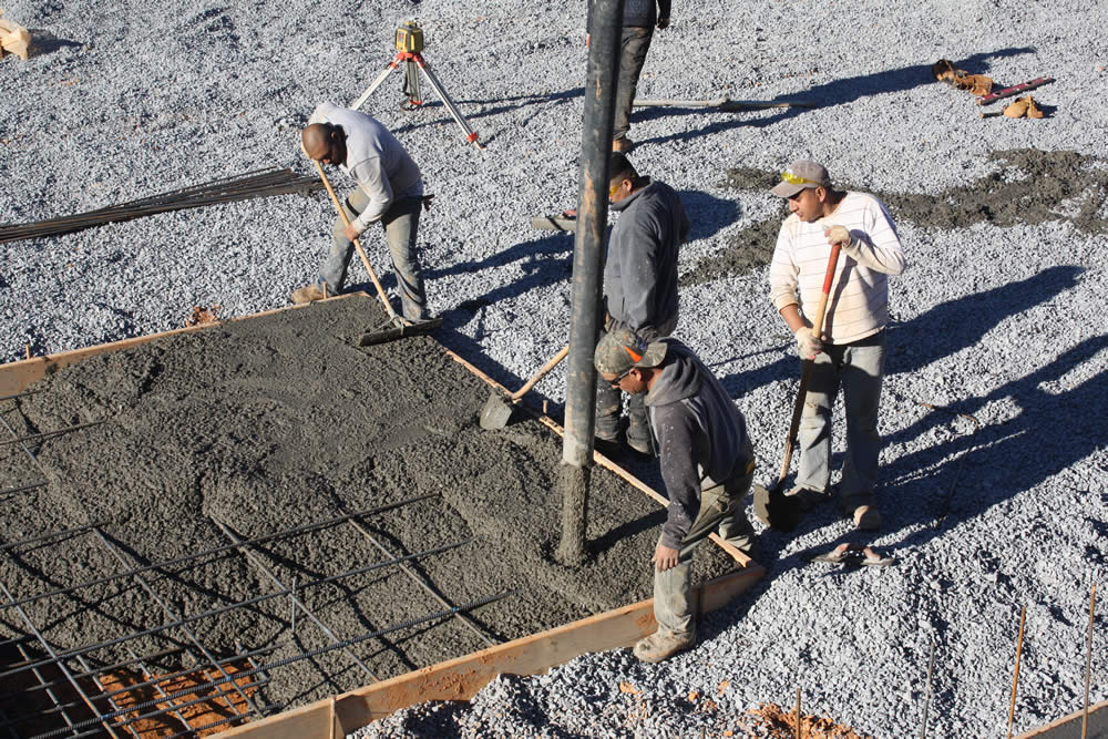 Pouring cement into a pier.