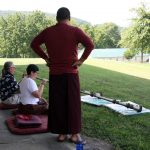 Ven. Acarya Namdrol Gyatso instructs students during instrument class.