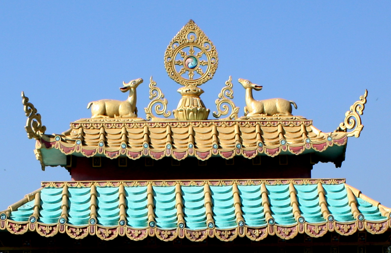The Mindrol Gatsal ornament of the dharmachakra, deer and parasol will be similar to that on the main gate to Mindrolling Monastery.