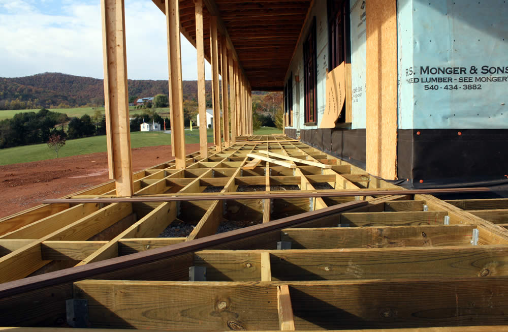 The veranda foundation will support weather-resistant flooring.