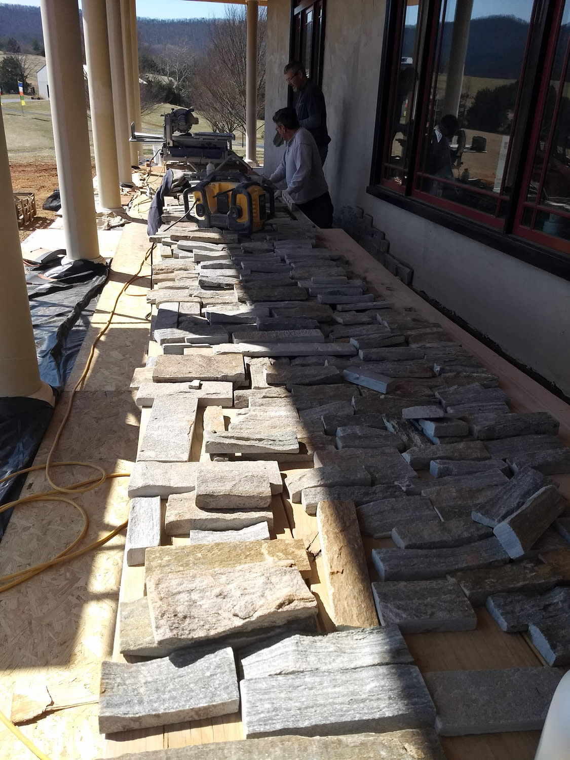14 March 2019 - Stone work underway on lower south wall.