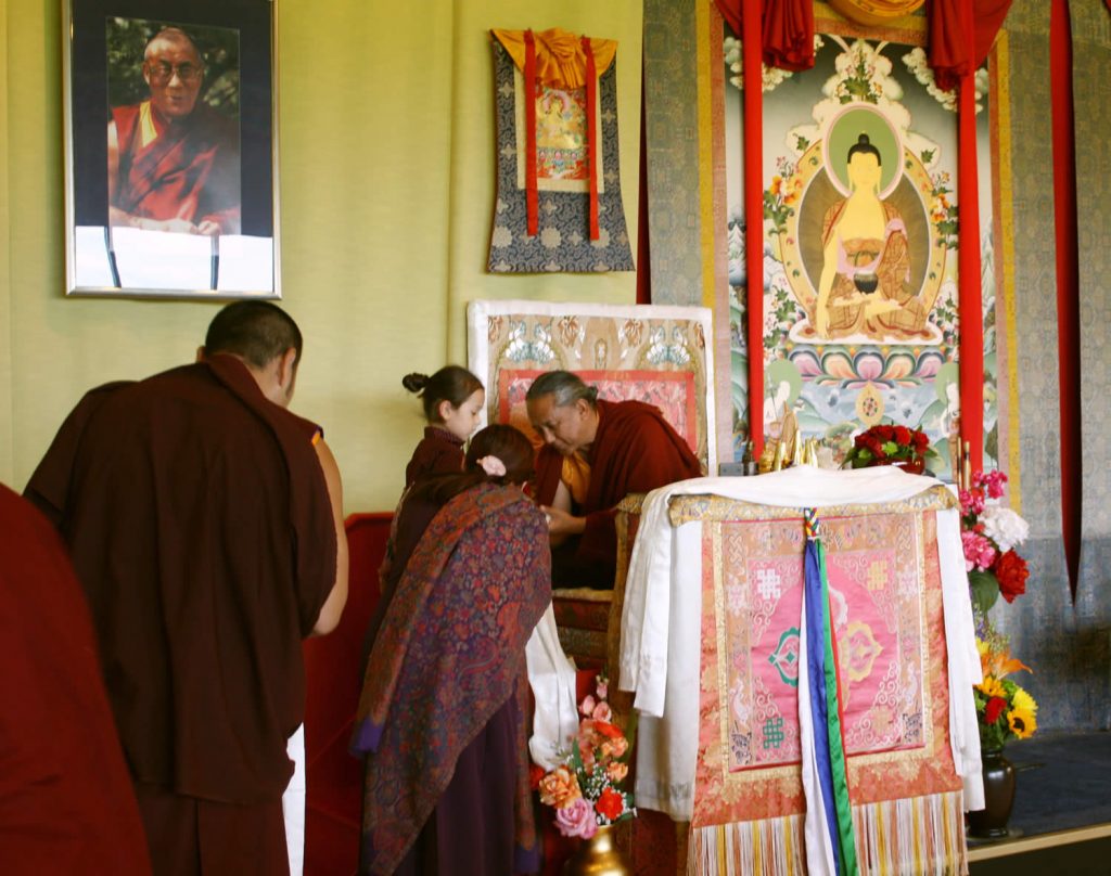 H.E. Dzigar Kongtrul Rinpoche receives kathags from Minling Dungse Rinpoche and Minling Jetsün Dechen Paldrön