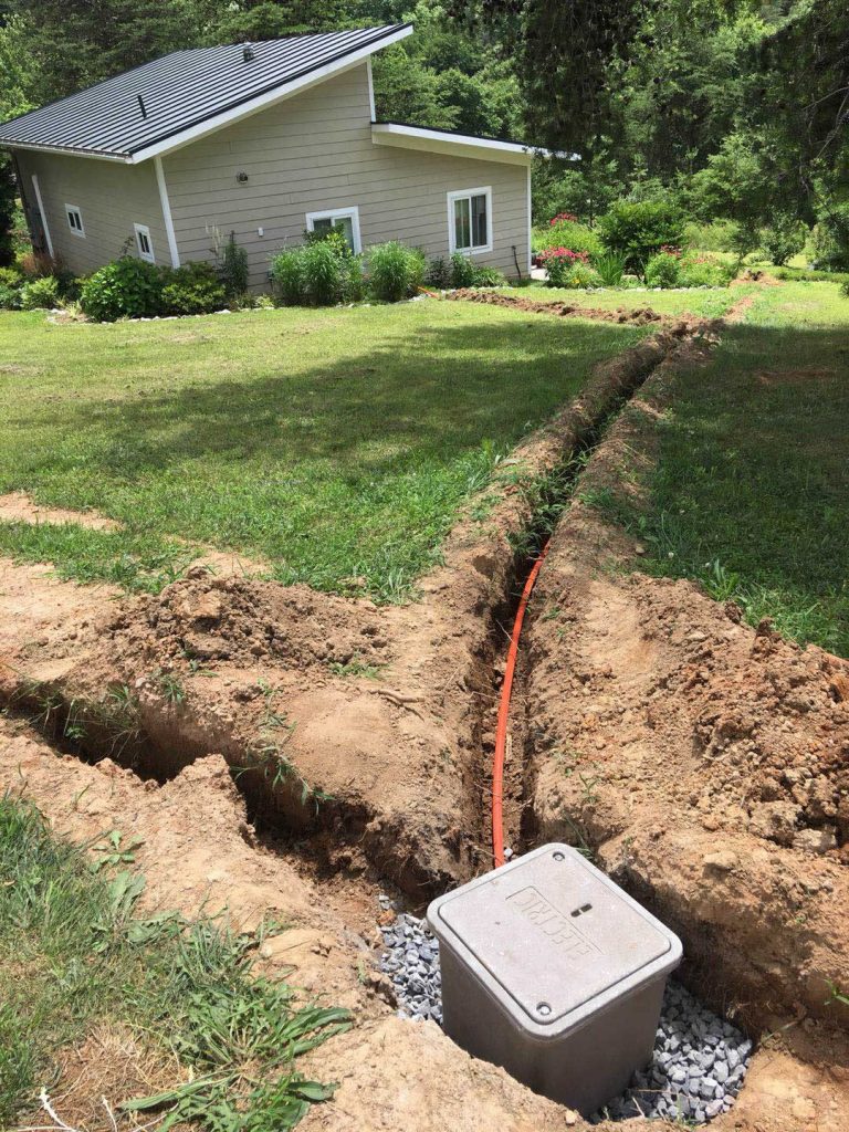 One of five small handholes at Dechen Gatsal which distributes cat6 cable wiring.