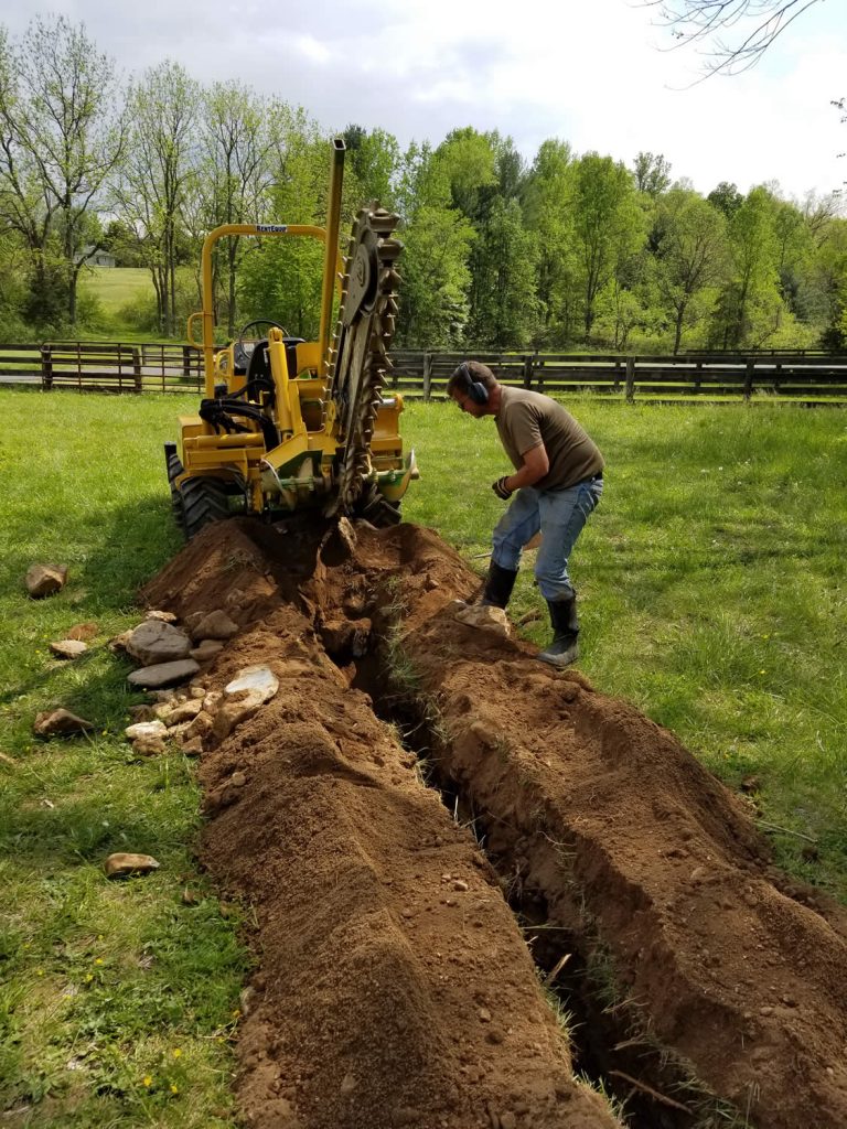 Removing rocks from the trench