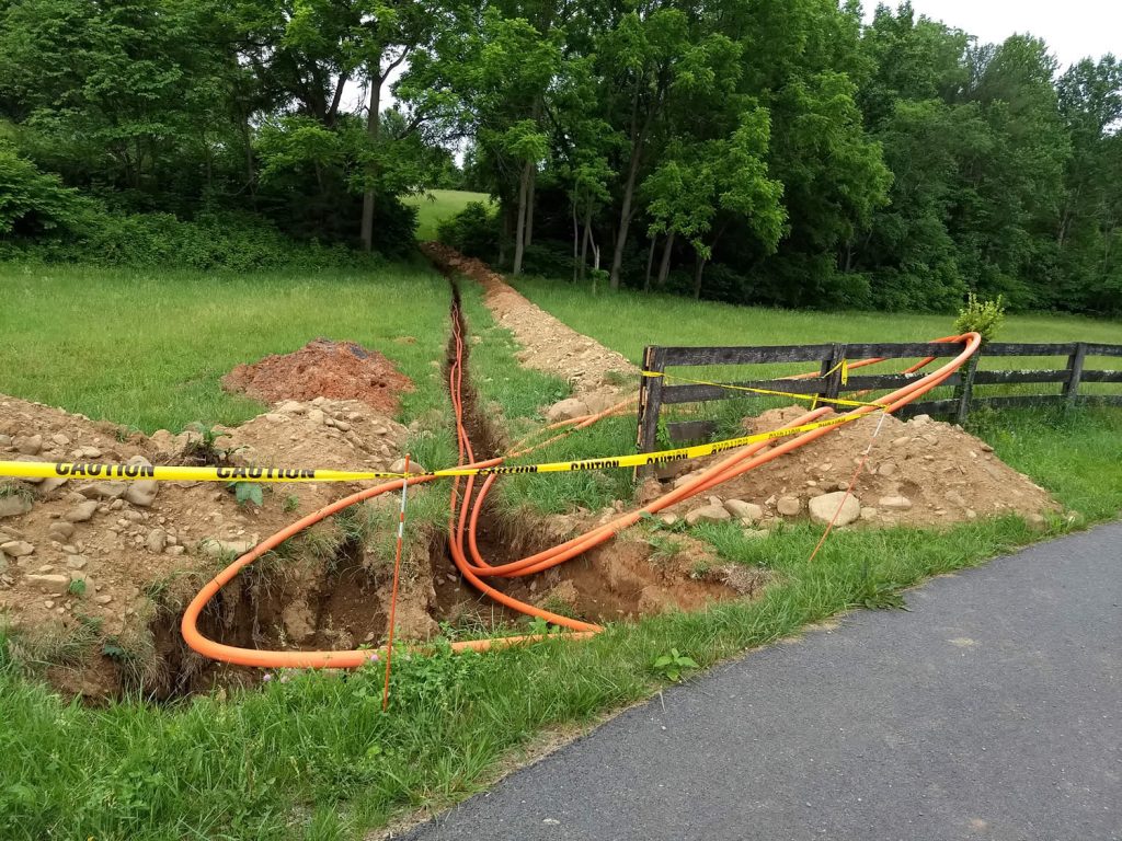 Conduit is installed for fiber optic cable which will run under Mindrolling Drive and lower parking lot.