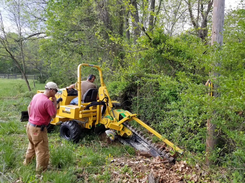 Dean Baker and Roar Vestre beginning work with the trencher