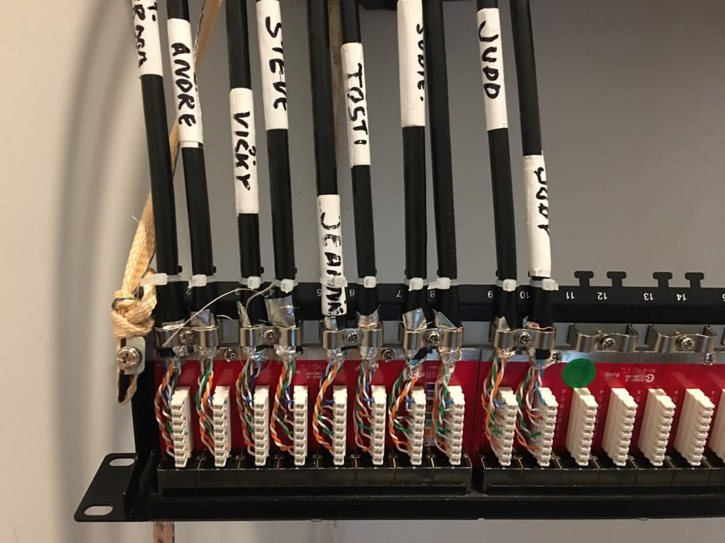 Wiring the Dechen Gatsal network server rack.