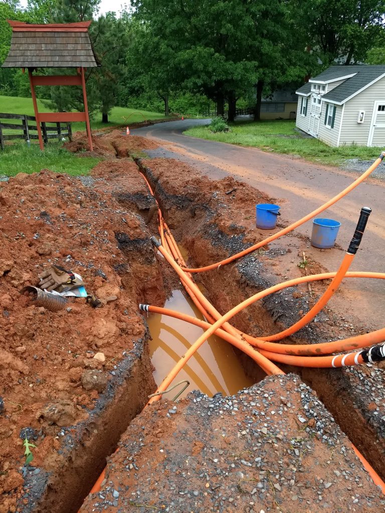 Rain water fills the trench after a storm