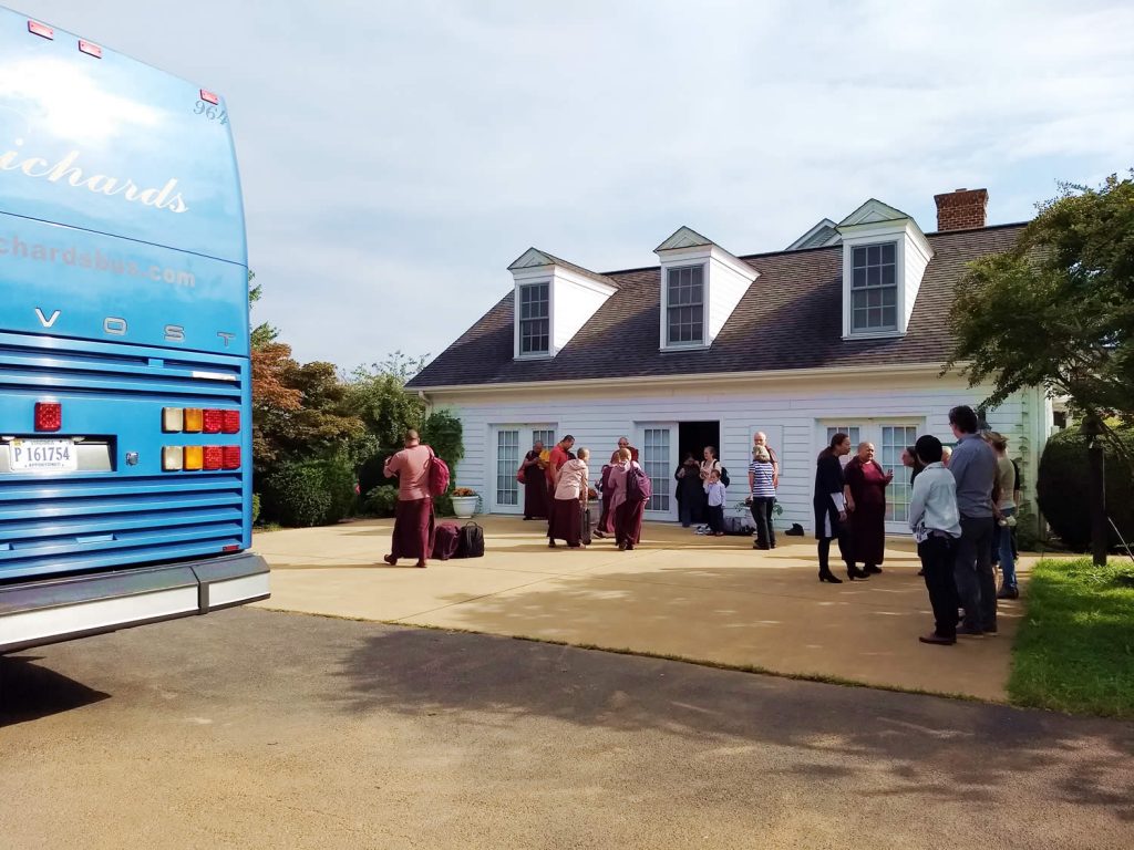 Jetsün Khandro Rinpoche, Jetsün Dechen Paldrön and Lotus Garden sangha members prepare to board a bus from Lotus Garden to airport for the flight to Greece.