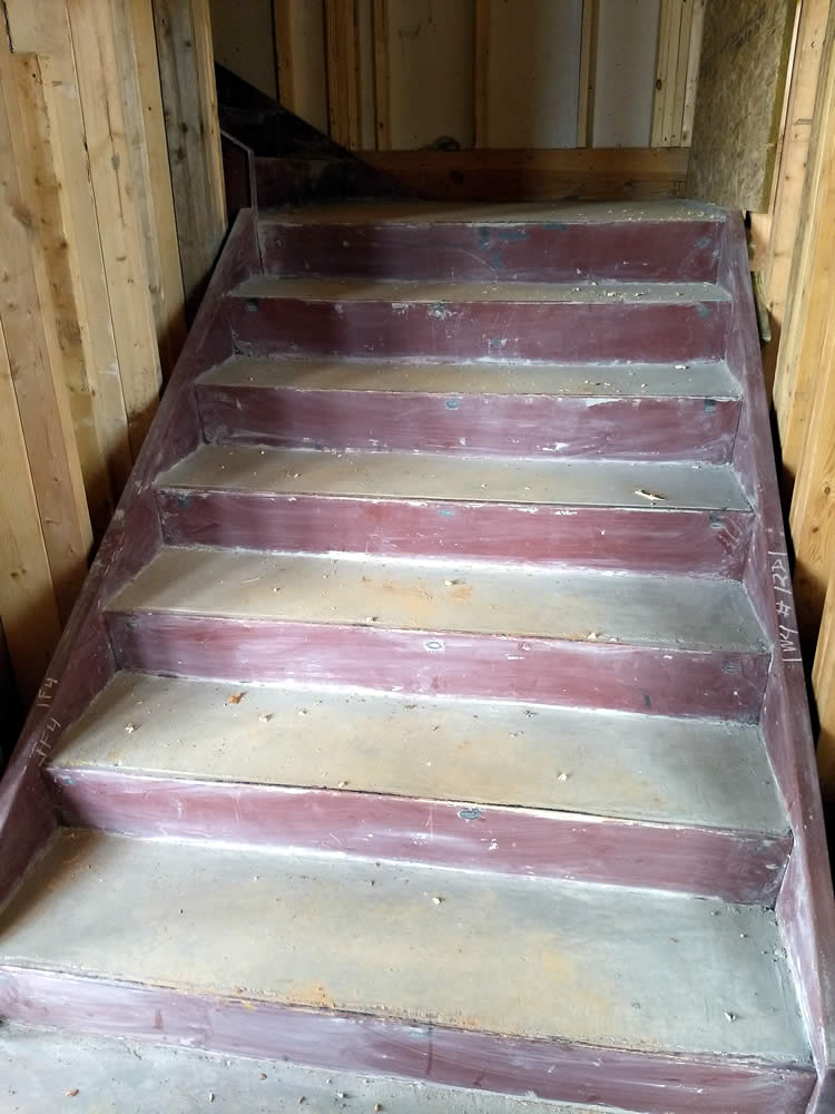 Installation of new custom-fabricated stairway has been completed.