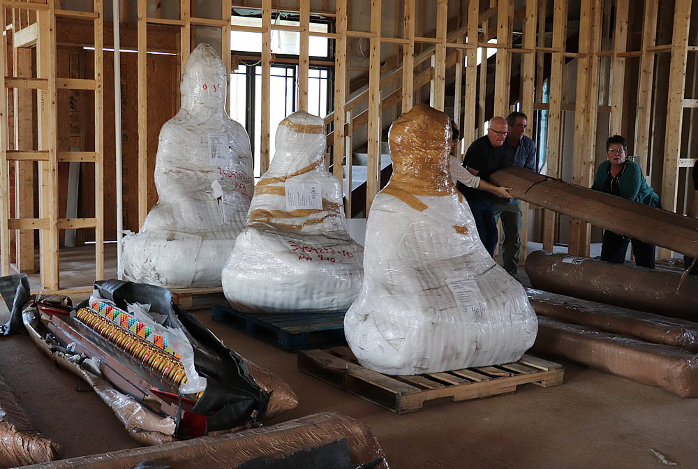 Statues of Buddha Shakayamuni, Guru Rinpoche and Terdag Lingpa which will remain wrapped until it is time to fill and consecrate them.