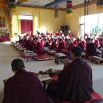 Mindrolling monks lead students in a practice